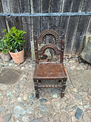 Discover our unique 17th century oak chair from South Yorkshire/Derbyshire. With intricate carvings, in excellent condition. Shop now for antique furniture!