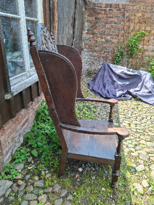 Discover our 17th-century carved oak lambing chair with Tudor flower detailing. Size H 136 x W 64 x D 60 cm. Explore now for top quality vintage furniture.