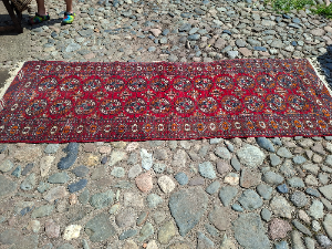 Explore our collection of premium Bokhara runners! Dive into the luxurious feel of our 280x95cm runner on a vibrant red ground. Shop now for unmatchable quality.
