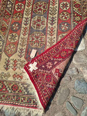 Discover our exquisite Antique Red Persian Rug, sized 145x85 cm. Dive into a world of luxuriant textiles and order your piece of history today.