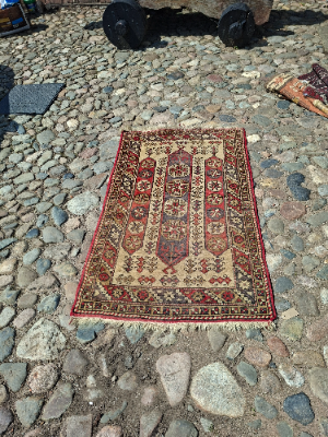 Discover our exquisite Antique Red Persian Rug, sized 145x85 cm. Dive into a world of luxuriant textiles and order your piece of history today.