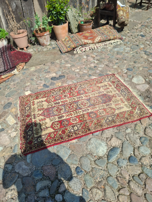 Discover our exquisite Antique Red Persian Rug, sized 145x85 cm. Dive into a world of luxuriant textiles and order your piece of history today.