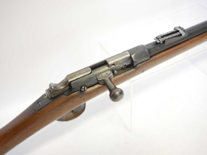 Discover our M.12874 11mm French Gras bolt action rifle, featuring a 32 inch barrel, folding ladder sight & bayonet bar. Experience top quality from St Etienne arsenal, dated 1874. Shop now for this original, excellent-condition piece!