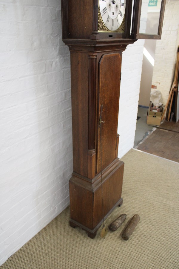 A George III Oak And Mahogany Longcase Clock