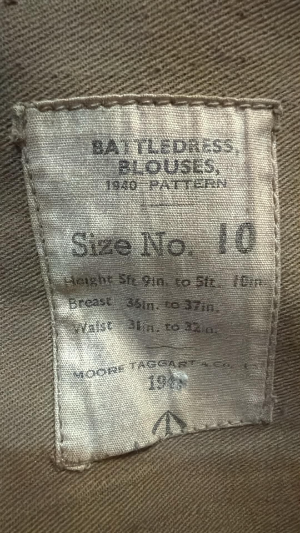 A Second World War Royal Corps of Signals uniform group belonging to K. W. Starling, service number 14965734.

The group comprises a 1940 Pattern, Size 10 battledress blouse and matching trousers, together with a dispatch rider’s helmet and a green felt shoulder flash, which was found in the pocket of the blouse. Both the battledress blouse and trousers are named to Starling. The helmet is unnamed, but was acquired with the uniform from the family.

The date on the blouse label is no longer visible; however, the tunic bears a “Z” stamp above the WD broad arrow, indicating acceptance in 1945.

According to provenance supplied by the family, K. W. Starling had previously worked for the General Post Office as a telephone engineer. His employment was regarded as a reserved occupation, initially preventing him from joining the Armed Forces. He eventually joined the British Army in late September 1944 and was posted to the Royal Corps of Signals, where he served as a dispatch rider.

Family history further records that Starling was sent to the Parachute Regiment for basic training and subsequently took part in Operation Varsity, the Allied airborne operation across the Rhine in March 1945, during which he was wounded in combat.

Provenance: Acquired from the family of K. W. Starling. Details of his wartime service and the history of the group were recorded in email correspondence from the family which is also included in paper format.