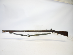 A rare percussion Brunswick P1837-type .704 calibre long rifle, distinguished by its unusually long 40-inch barrel. The barrel features the characteristic two-groove rifling designed for the Brunswick belted ball and is fitted with two blade sights and a bayonet bar. The rifle retains a back-action percussion lock.

No visible maker’s or military markings are present, although the barrel has not been removed to examine the underside for proofs or other marks.

Believed to be an early 1840s example, it displays the early first-pattern bayonet bar together with a later-pattern butt plate—an interesting combination of features on an unusual Brunswick-type rifle.

Purchased from IMA in America.

Section 58 (2) Antique / obsolete calibre, can be owned without a licence.