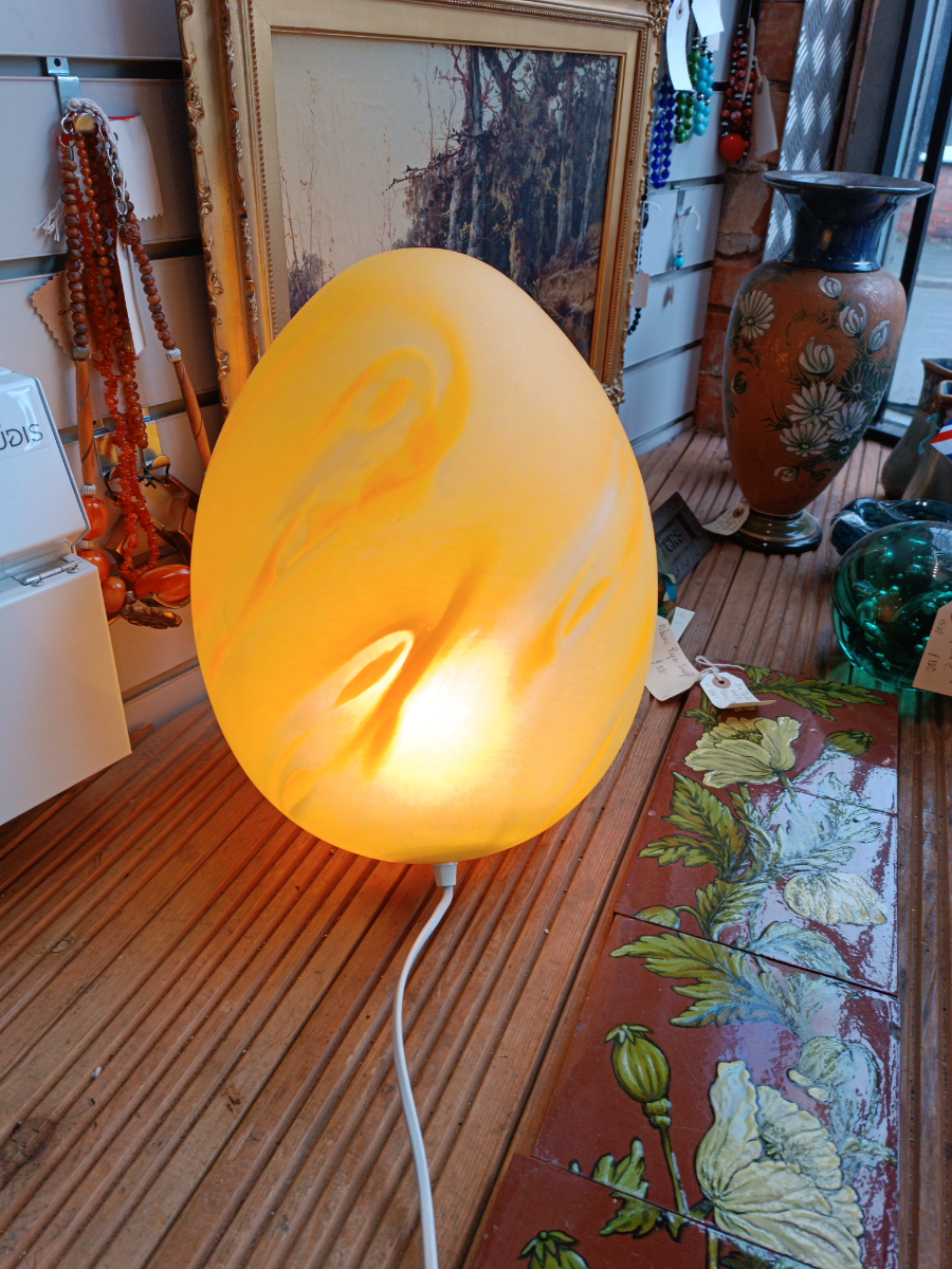 Discover the allure of French Vianne Glass with our vintage table lamp by Serge Ligardes. It's a charming 20th-century piece with a unique egg shape. Shop now!