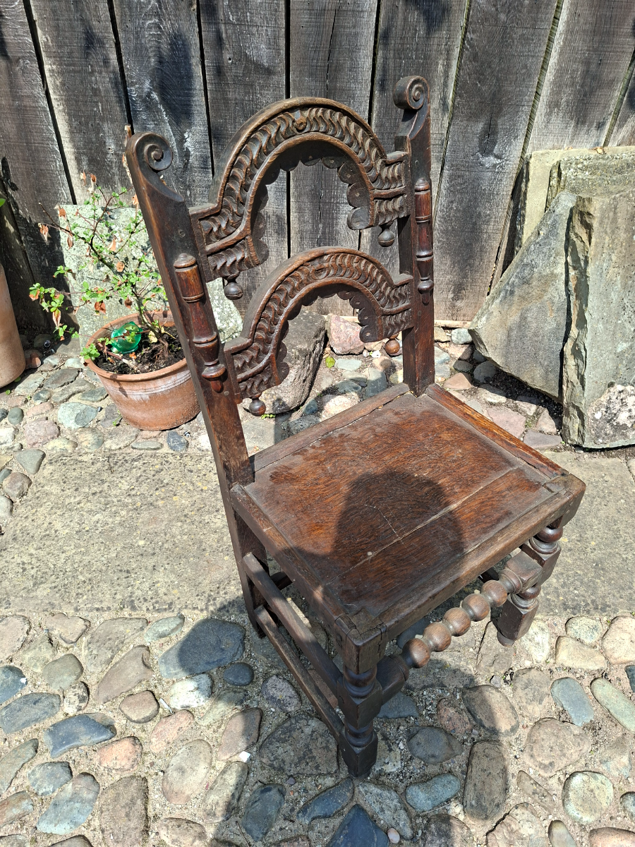 Discover our unique 17th century oak chair from South Yorkshire/Derbyshire. With intricate carvings, in excellent condition. Shop now for antique furniture!