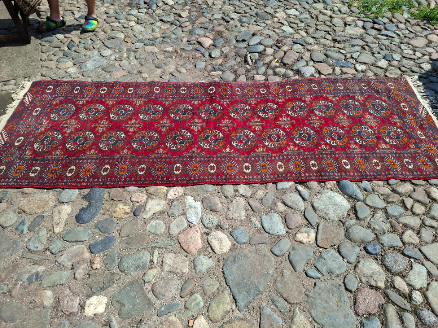 Explore our collection of premium Bokhara runners! Dive into the luxurious feel of our 280x95cm runner on a vibrant red ground. Shop now for unmatchable quality.