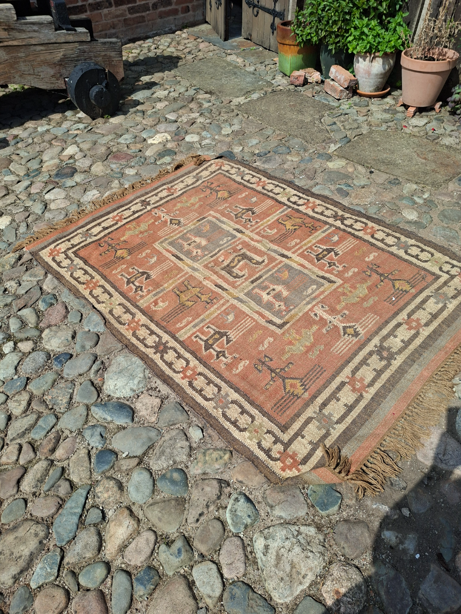 Discover our range of authentic, old African tribal rugs. Sized at 185x130cm, these unique pieces will transform any space. Shop now for exclusive deals.