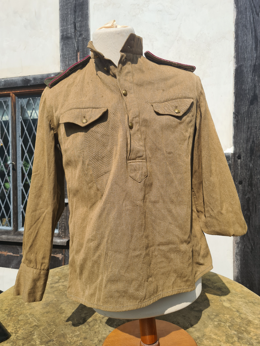 Discover our top-notch reproduction Russian M43 Gimnasterka in excellent condition. Save now with fantastic deals on military apparel. Shop today!