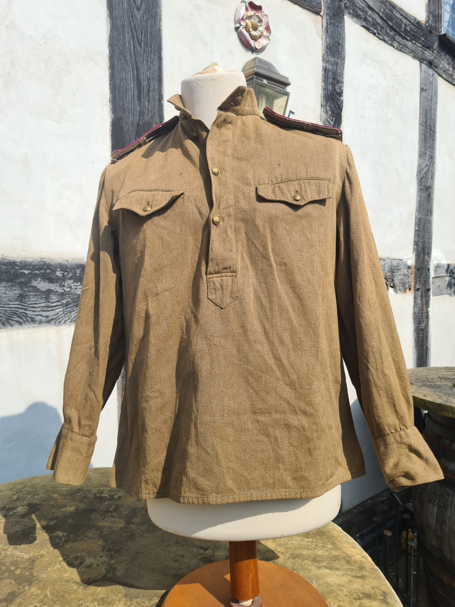 Discover our top-notch reproduction Russian M43 Gimnasterka in excellent condition. Save now with fantastic deals on military apparel. Shop today!