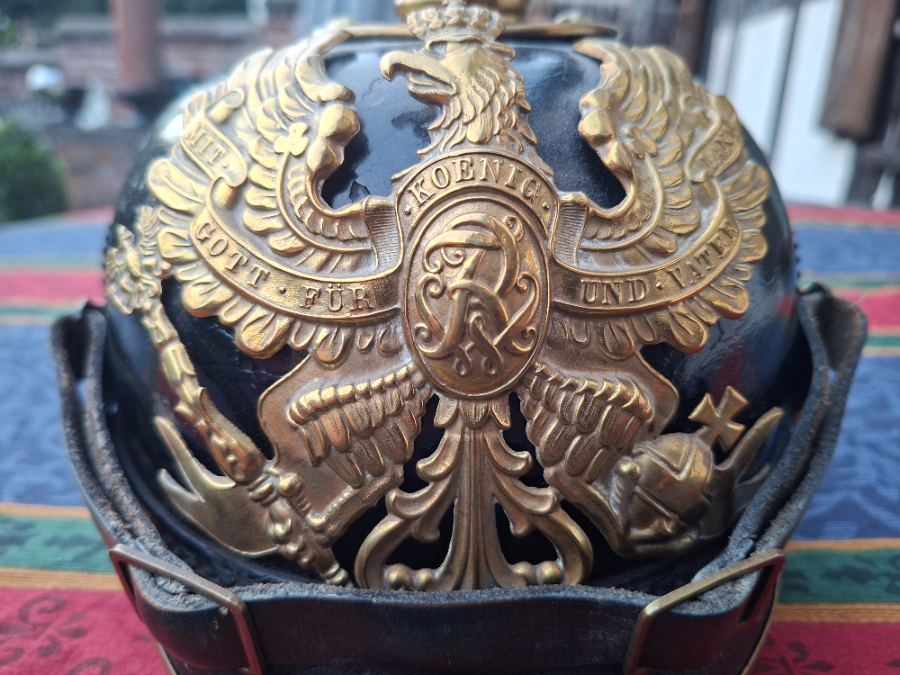 Discover our range of Prussian Grenadier Pickelhaubes, post-1897, perfect for history enthusiasts. Our helmets feature FWR monograms, brass details, and authentic cocoardes. Shop now!