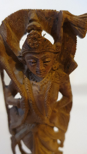 Discover our collection of intricately carved, antique wooden statues. Representing the 7th Avatar of Hindu God Vishnu, made from mesmerizing Sandalwood. Shop now!