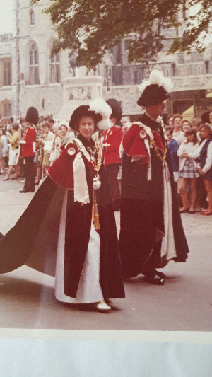 Browse our collection of official photographs featuring Queen Elizabeth II in her Knight of the Garter robes. Ideal for history enthusiasts and collectors. Shop now!