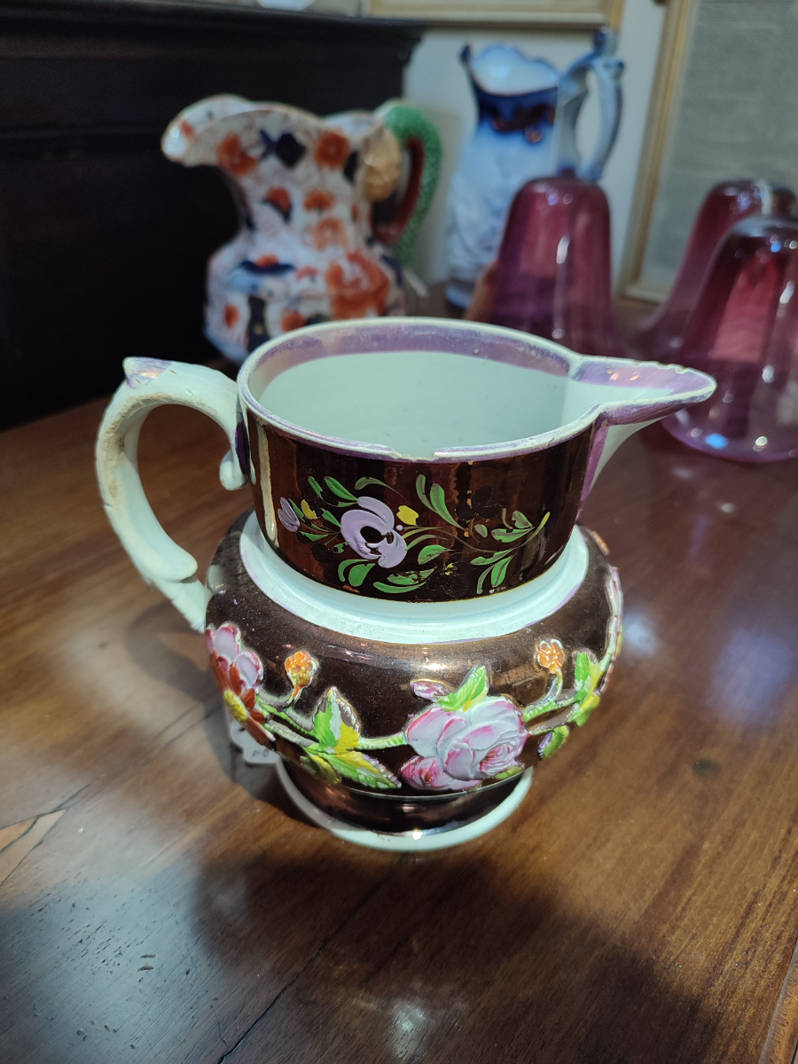 Explore our collection of authentic 1830 English Lustreware jugs! Despite minor nibbles on the spout and rim, they add old-world charm to any space. Shop now!
