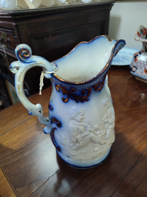 Staffordshire Moulded Mask Jug.