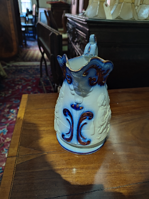 Discover our selection of Staffordshire moulded mask jugs from the 1830s-40s. Despite minor wear, this 8-inch-tall piece maintains its charm. Shop now!