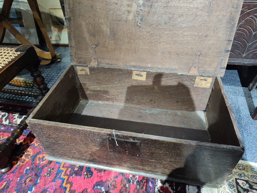 Discover our small 17th century oak bible box, perfect for storage. Dimensions: 67cm W x 38cm D x 25cm H. Shop now for vintage elegance!