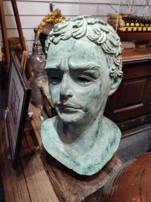 Discover our unique Bronze Head on a Wooden Base, a fine tribute to classical art. Add elegance to your space. Shop now for mystery-rich art pieces!