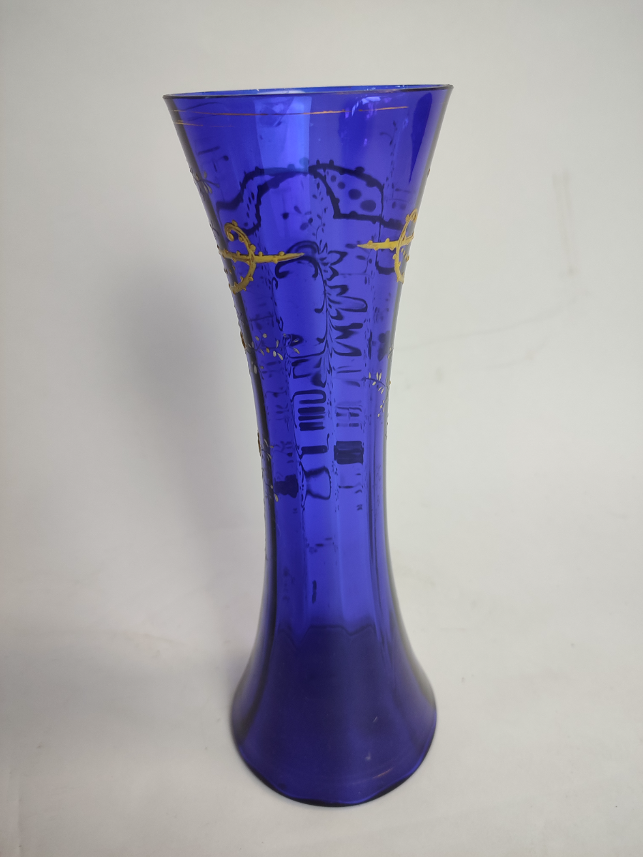 Discover our unique collection of 19th century Bohemian blue glass, each piece standing at an impressive 28cm. Shop now and add a touch of vintage elegance to your space.