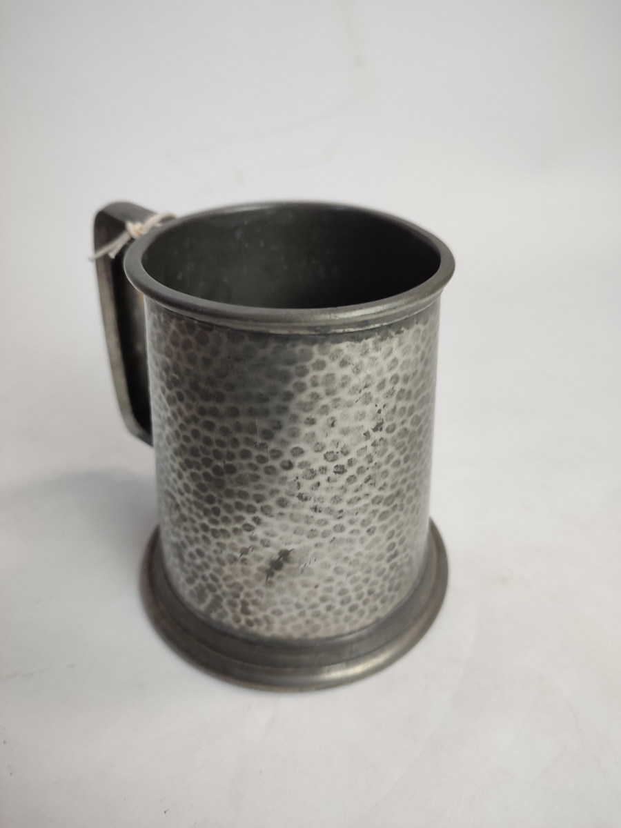Discover Craftsman Pewter's Arts and Crafts pewter tankard. Handcrafted in Sheffield. Perfect for a unique gift. Shop now and bring tradition home!