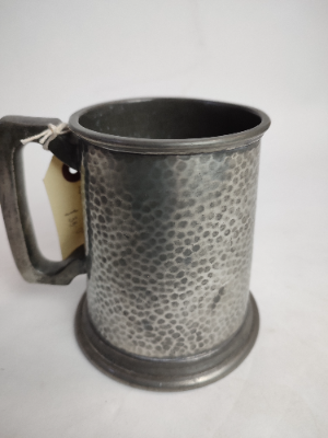 Discover Craftsman Pewter's Arts and Crafts pewter tankard. Handcrafted in Sheffield. Perfect for a unique gift. Shop now and bring tradition home!