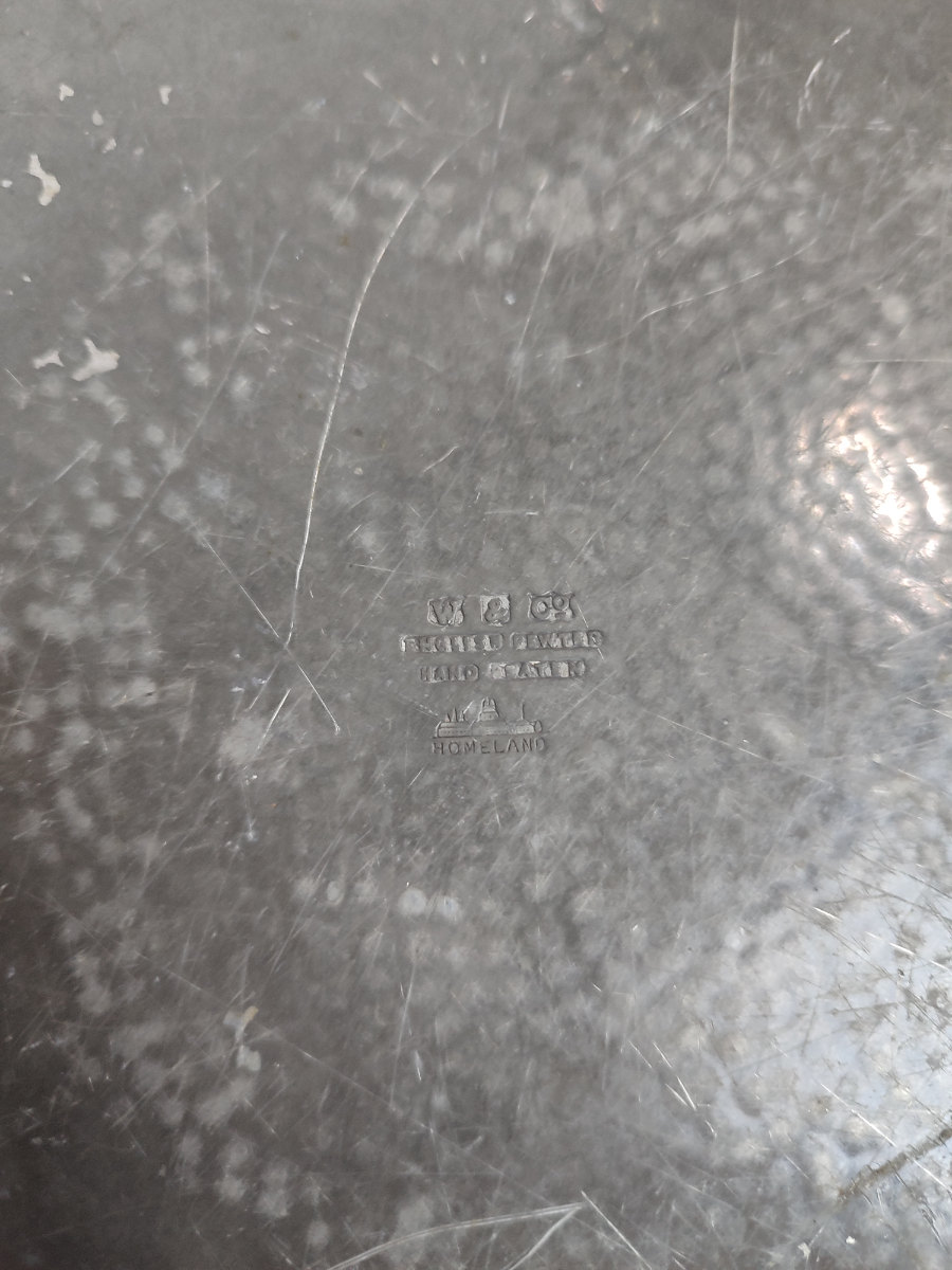 Discover our exquisite Arts and Crafts pewter tray by W&C, 27cm in width, perfect for your home decor. Shop now to add a vintage flair to your collection.