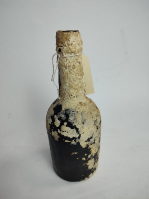 19th Century Moulded Glass Excavated Bottle.