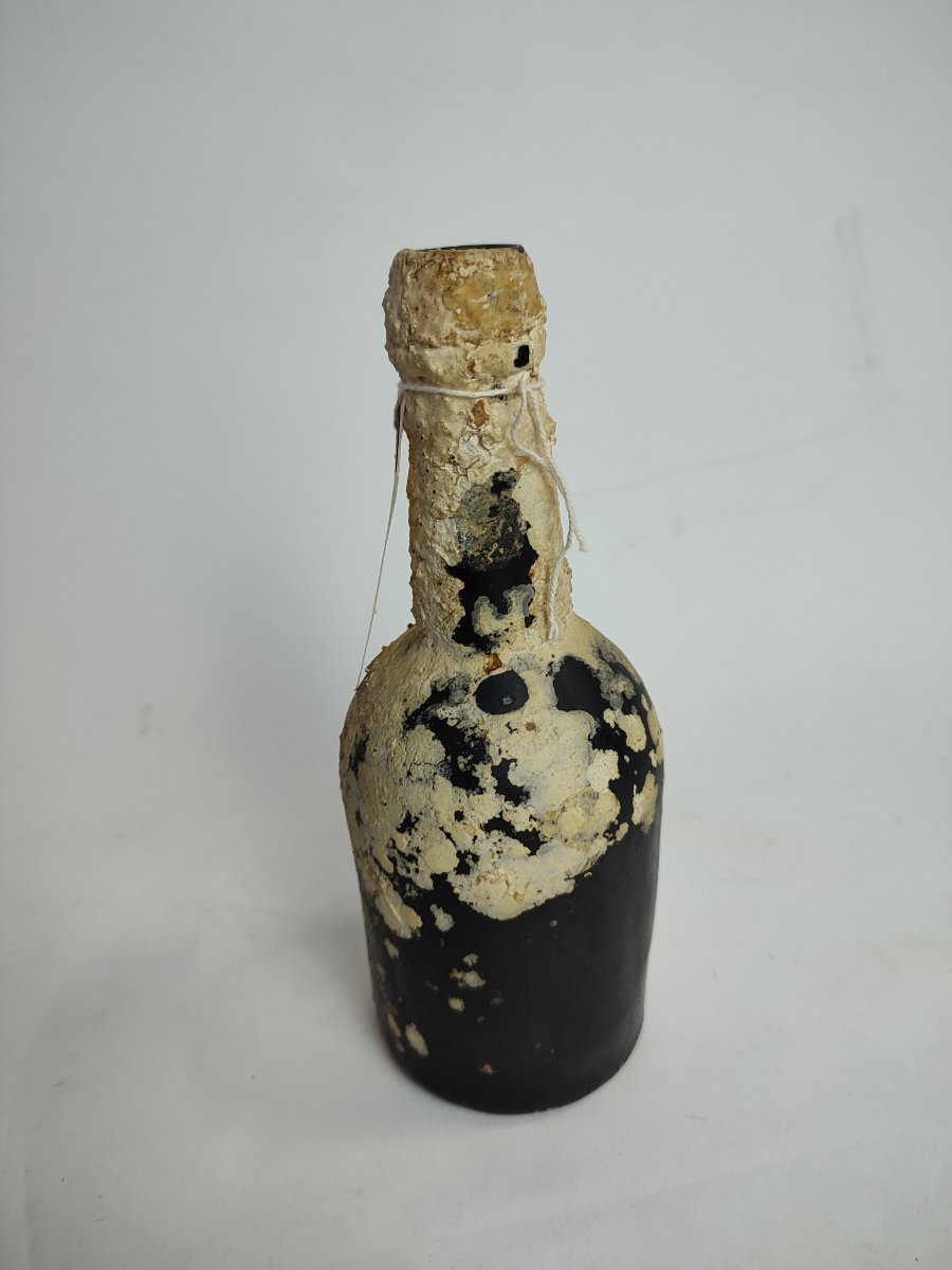 19th Century Moulded Glass Excavated Bottle.