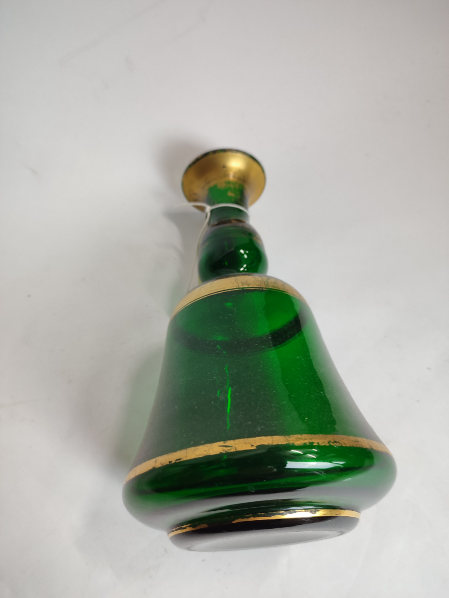 Discover our unique Victorian green glass carafe collection. With distinct patterns and expert craftsmanship, they exude elegance. Shop now for your perfect piece!