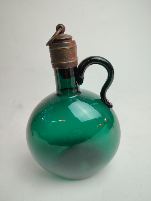 Discover our collection of early 19th century Bristol green decanters, featuring a uniquely silvered cork stopper. Height, 18cm. Shop now!