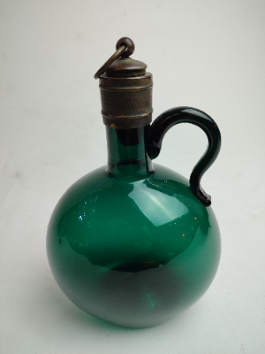 Discover our collection of early 19th century Bristol green decanters, featuring a uniquely silvered cork stopper. Height, 18cm. Shop now!