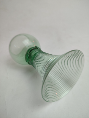 Explore our collection of antique German Roemer green glasses, dated the 19th century. Shop now and add a historic touch to your decor with their unique 14cm hollow stem design.