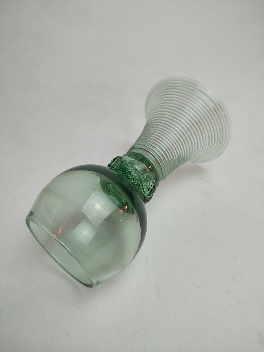 Explore our collection of antique German Roemer green glasses, dated the 19th century. Shop now and add a historic touch to your decor with their unique 14cm hollow stem design.