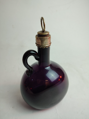 Explore our collection of Georgian dark amethyst flasks from the 1830-1840 period. Perfectly measured 22cm high, in excellent condition. Shop now for vintage charm!