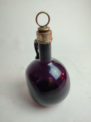 Explore our collection of Georgian dark amethyst flasks from the 1830-1840 period. Perfectly measured 22cm high, in excellent condition. Shop now for vintage charm!