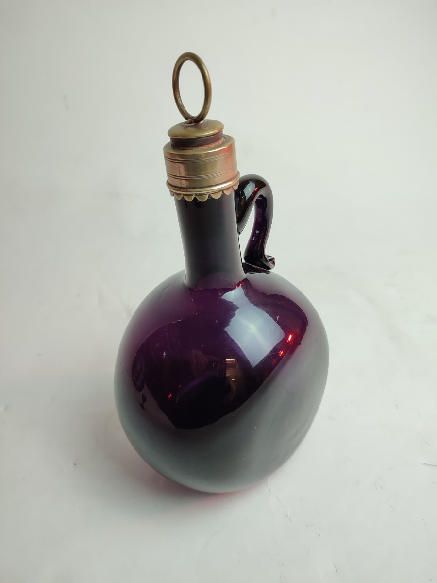 Explore our collection of Georgian dark amethyst flasks from the 1830-1840 period. Perfectly measured 22cm high, in excellent condition. Shop now for vintage charm!