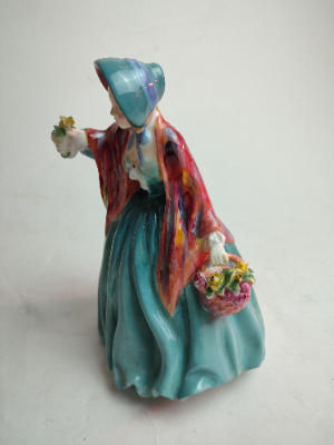 Discover our exquisite Royal Doulton Figurine, Lady Charmian (HN 1948), standing at 21cm tall. Shop now to enhance your collection with this unique piece!