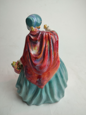 Discover our exquisite Royal Doulton Figurine, Lady Charmian (HN 1948), standing at 21cm tall. Shop now to enhance your collection with this unique piece!