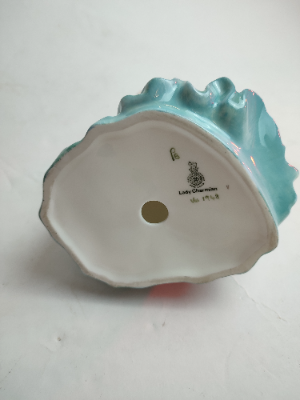 Discover our exquisite Royal Doulton Figurine, Lady Charmian (HN 1948), standing at 21cm tall. Shop now to enhance your collection with this unique piece!