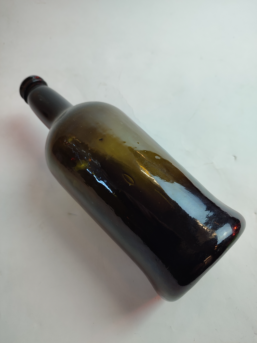 Discover our collection of mid-19th-century handmade bottles. This gorgeous 1840 piece stands at 27cm. Shop now for unique antique treasures.