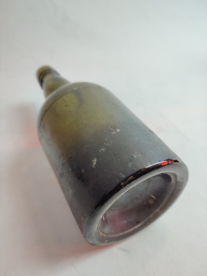 Discover our range of late 19th century moulded glass bottles, standing at a height of 21cm. Ideal for collectors. Shop now for your historical artefact.