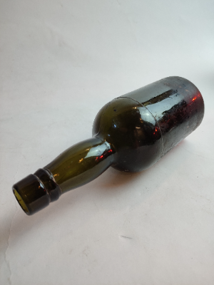 Discover our range of late 19th century moulded glass bottles, standing at a height of 21cm. Ideal for collectors. Shop now for your historical artefact.