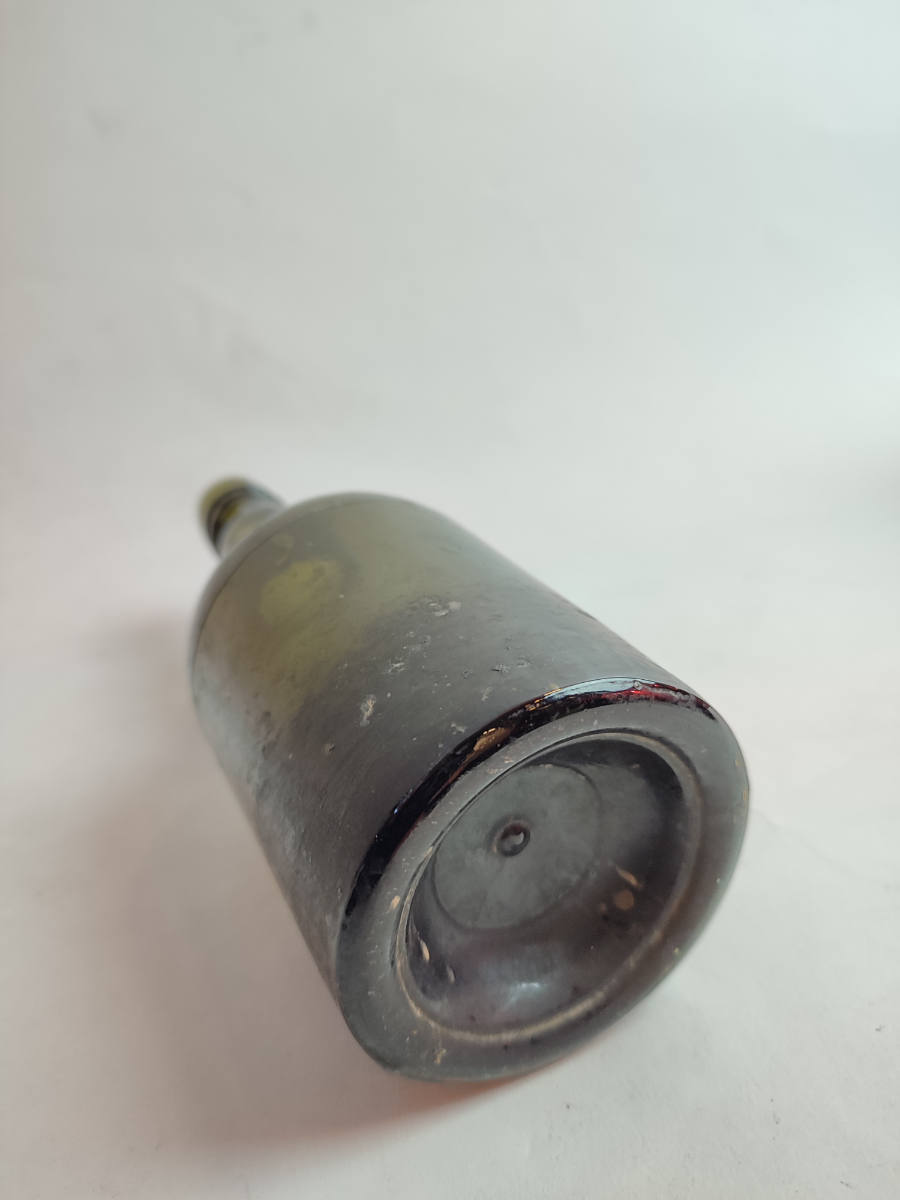 Discover our range of late 19th century moulded glass bottles, standing at a height of 21cm. Ideal for collectors. Shop now for your historical artefact.