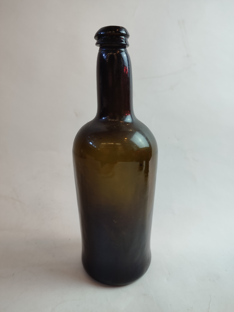 Explore our collection of 19th-century handmade bottles! Our circa 1840 bottle, standing at 27cm, is a standout. Shop now for antique glassware!