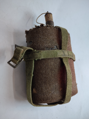 Explore our collection of authentic Second World War waterbottles with 1958 pattern carriers. Shop now and own a piece of history today.