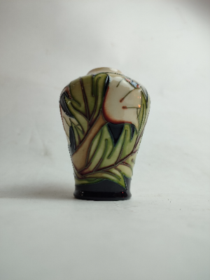 Discover our collection of Moorcroft vases by Sian Gibson. This 10cm piece in excellent condition awaits you. Shop today for these sought-after ceramics!