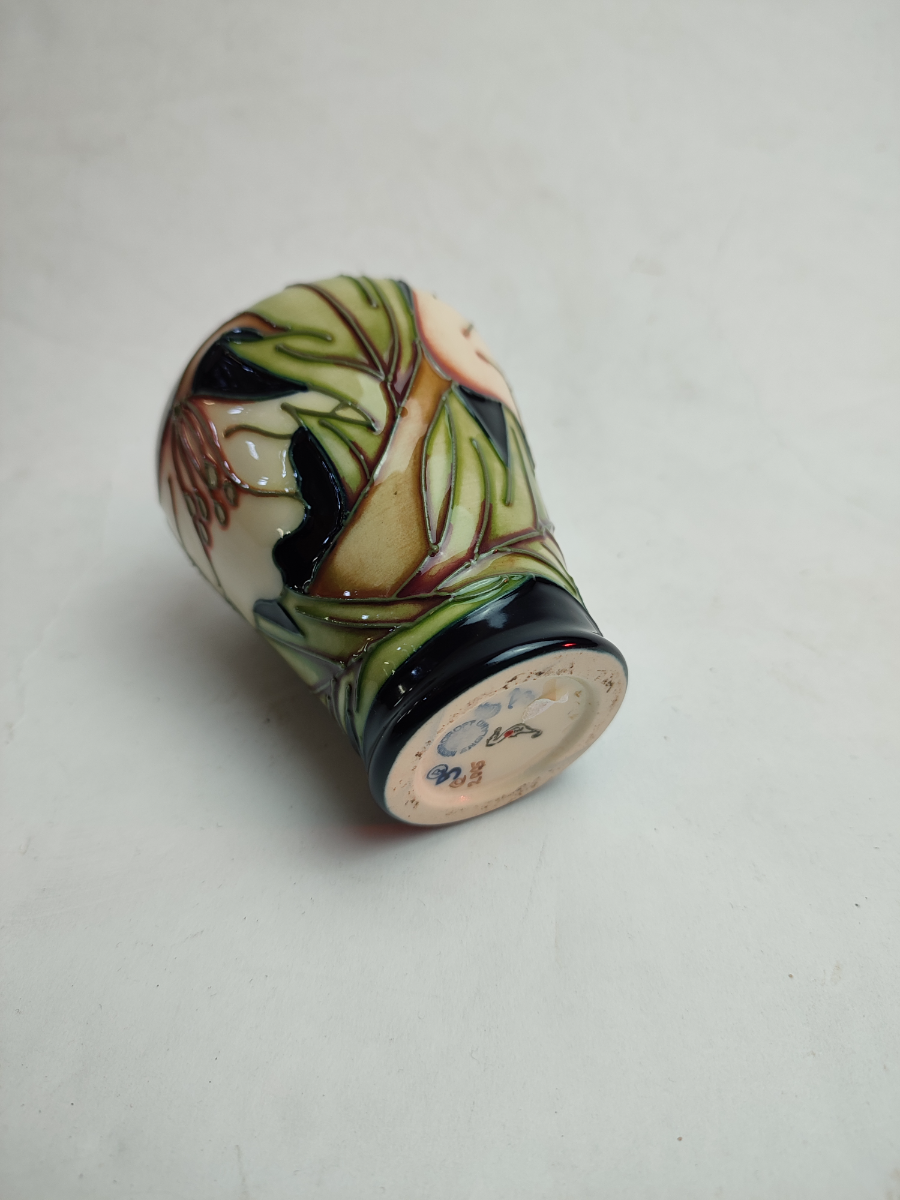 Discover our collection of Moorcroft vases by Sian Gibson. This 10cm piece in excellent condition awaits you. Shop today for these sought-after ceramics!