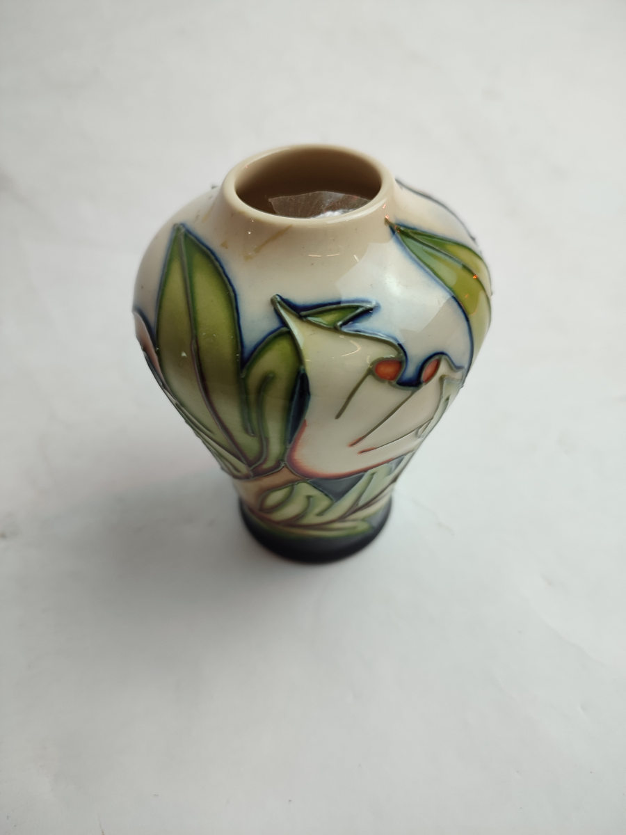 Discover our collection of Moorcroft vases by Sian Gibson. This 10cm piece in excellent condition awaits you. Shop today for these sought-after ceramics!